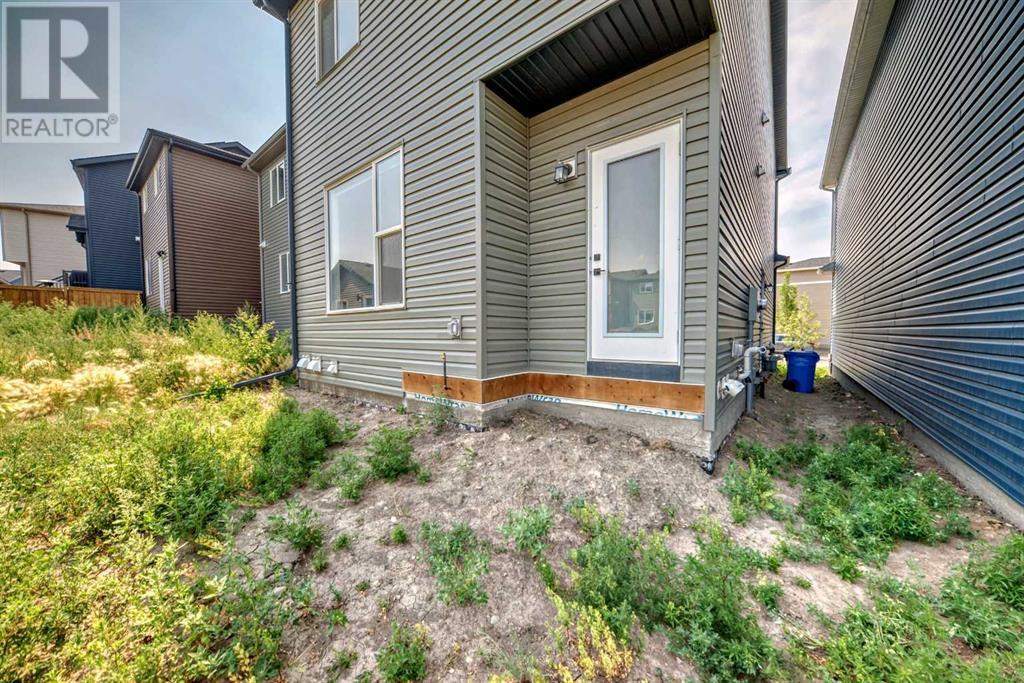 22 Amblehurst Way Nw, Calgary, Alberta  T3P 1W9 - Photo 18 - A2175611