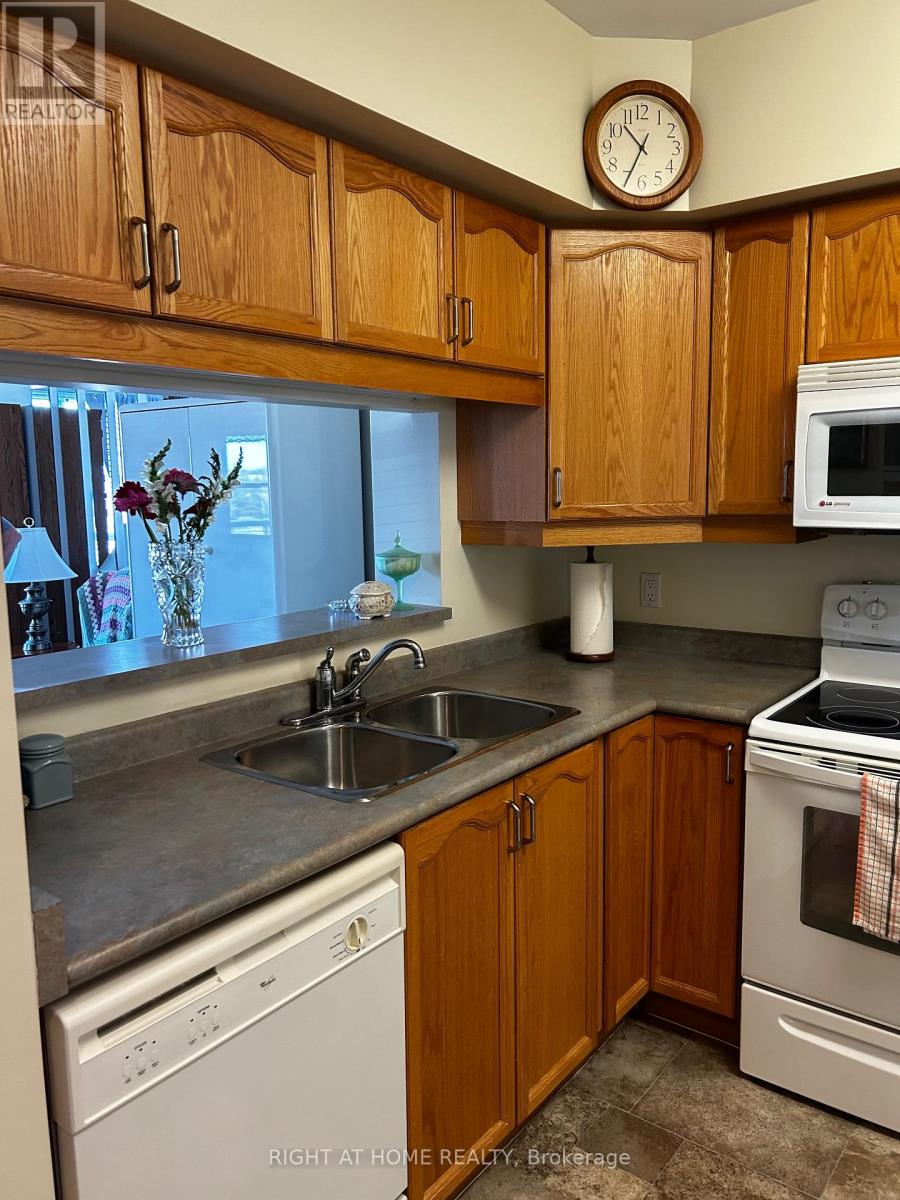 202 - 94 Dean Avenue, Barrie, Ontario  L4N 0M3 - Photo 20 - S8221892