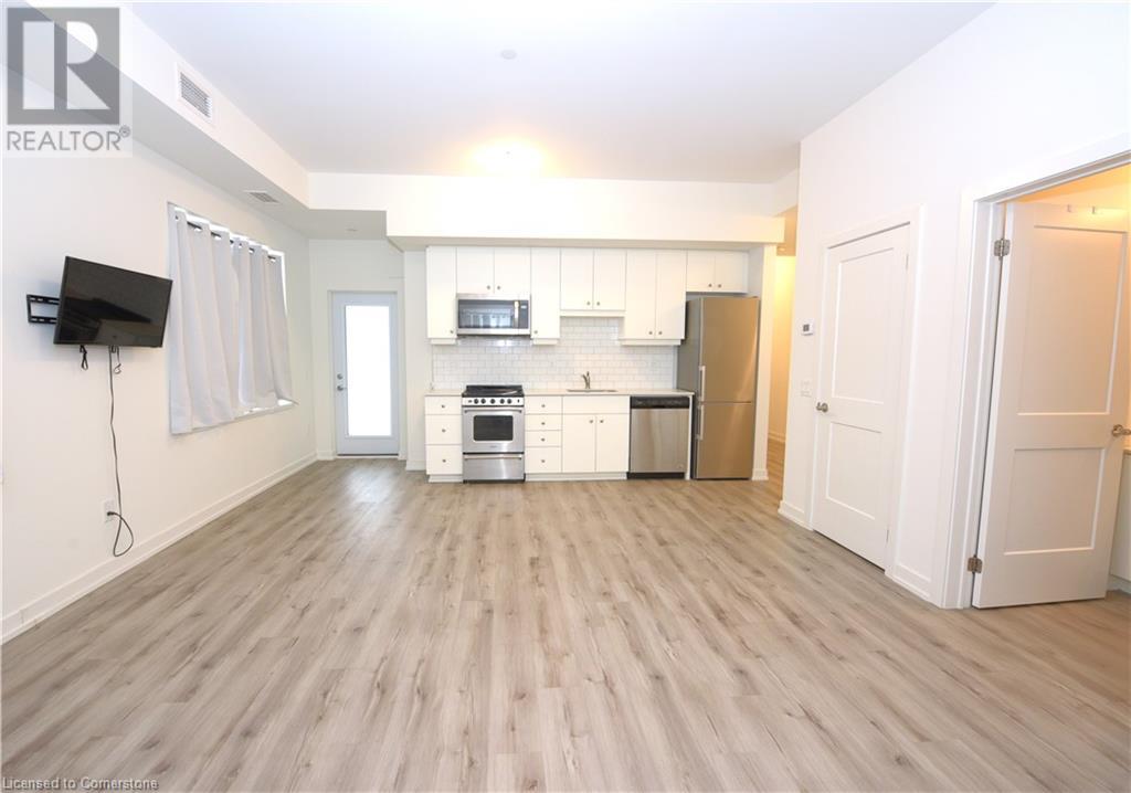 247 Northfield Drive E Unit# 102, Waterloo, Ontario  N2K 0H1 - Photo 2 - 40672599