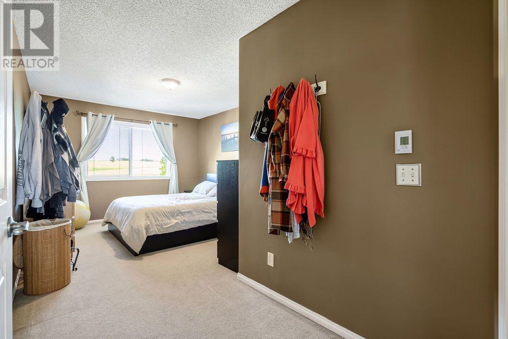 145 Crystal Shores Grove, Okotoks, Alberta  T1S 1Y3 - Photo 25 - A2174128