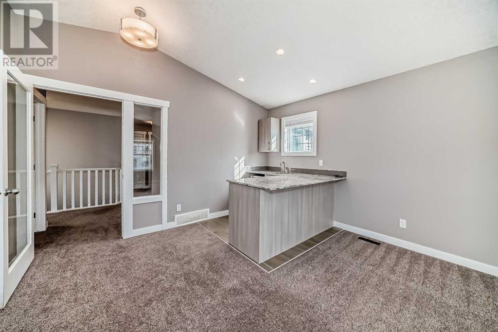 558 Sherwood Boulevard Nw, Calgary, Alberta  T3R 0R7 - Photo 22 - A2173873