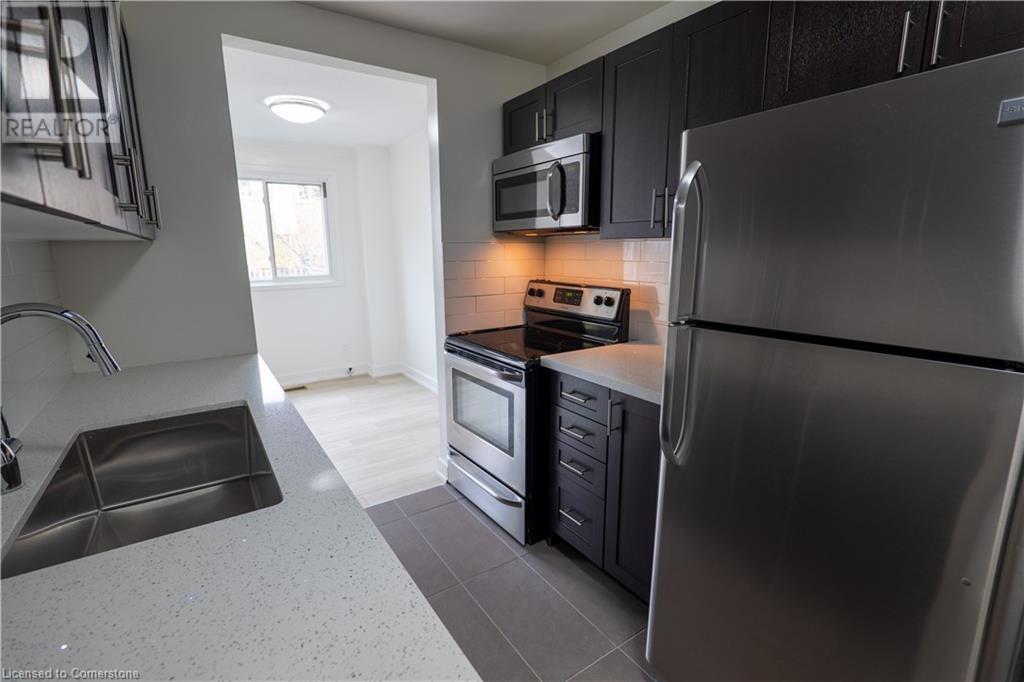 77 Tindale Court Unit# 63, Hamilton, Ontario  L8K 5M8 - Photo 7 - 40673041