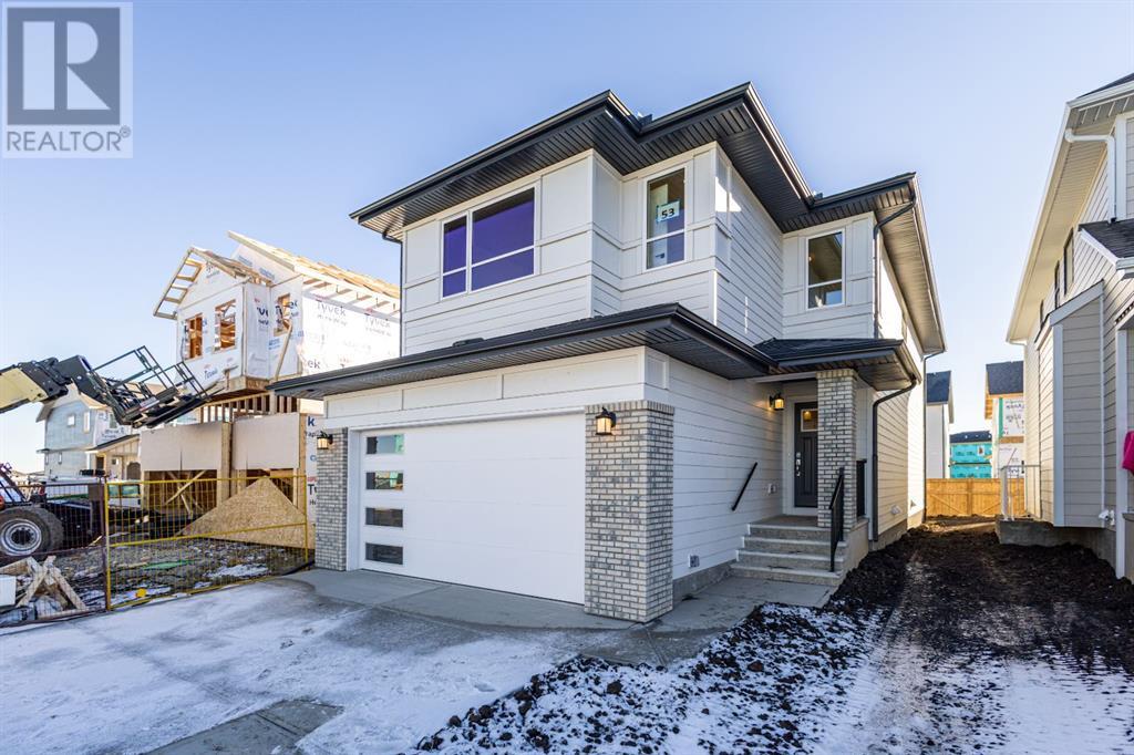 53 Versant Point Sw, Calgary, Alberta  T0L 1w0 - Photo 1 - A2177229