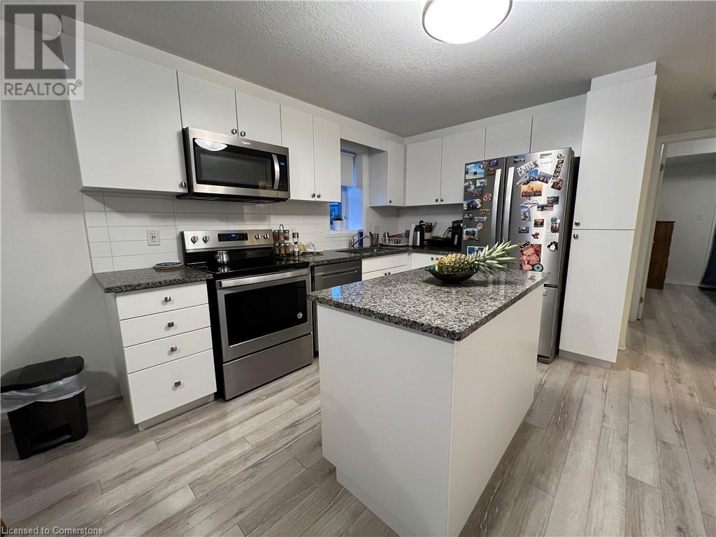 1989 Ottawa Street S Unit# 63a, Kitchener, Ontario  N2E 0G7 - Photo 14 - 40676316