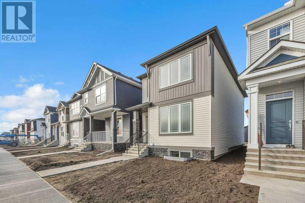 283 Hotchkiss Manor, Calgary, Alberta  T3S 0J8 - Photo 2 - A2176927