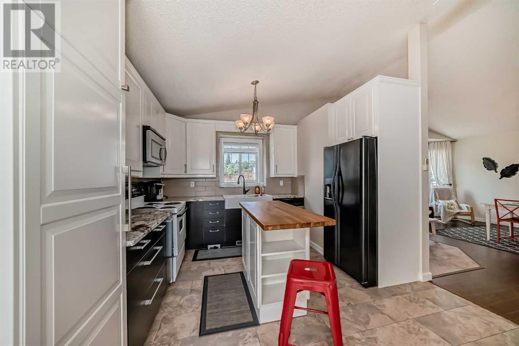 962 Harvest Hills Drive Ne, Calgary, Alberta  T3K 4L6 - Photo 6 - A2176867