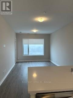 313 - 3265 Carding Mill Trail, Oakville, Ontario  L6M 0W6 - Photo 3 - W10427198