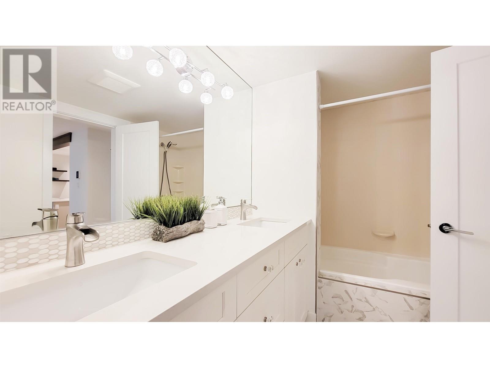 208 2733 ATLIN PLACE