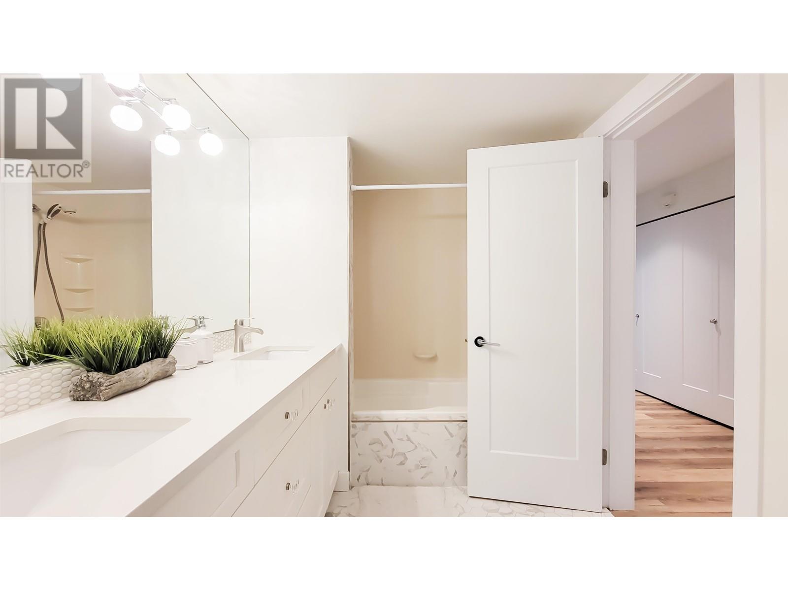 208 2733 ATLIN PLACE