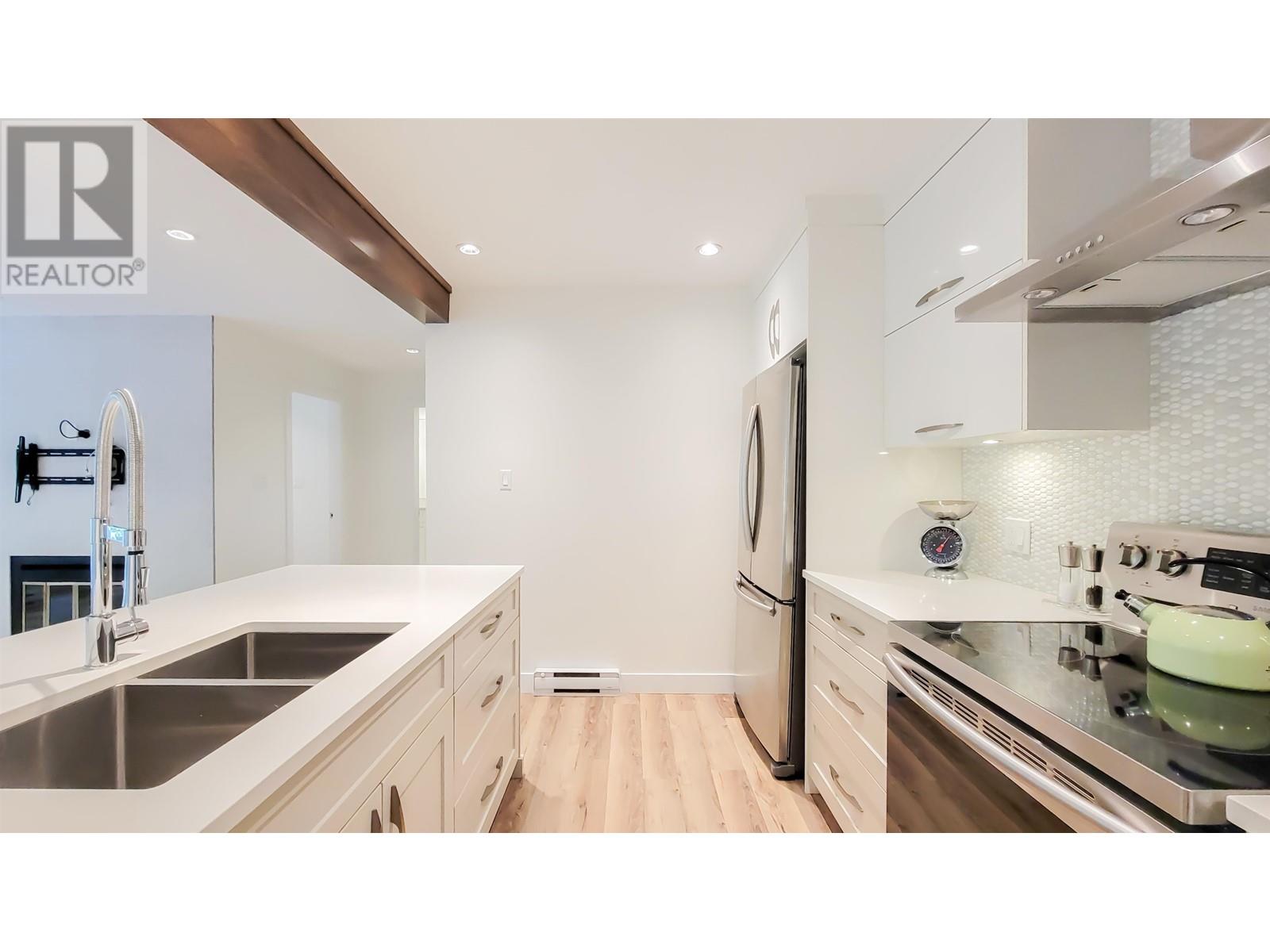 208 2733 ATLIN PLACE