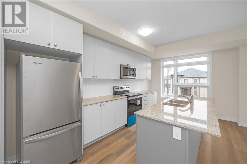 1569 Rose Way Unit# 109, Milton, Ontario  L9T 7E7 - Photo 4 - 40676651