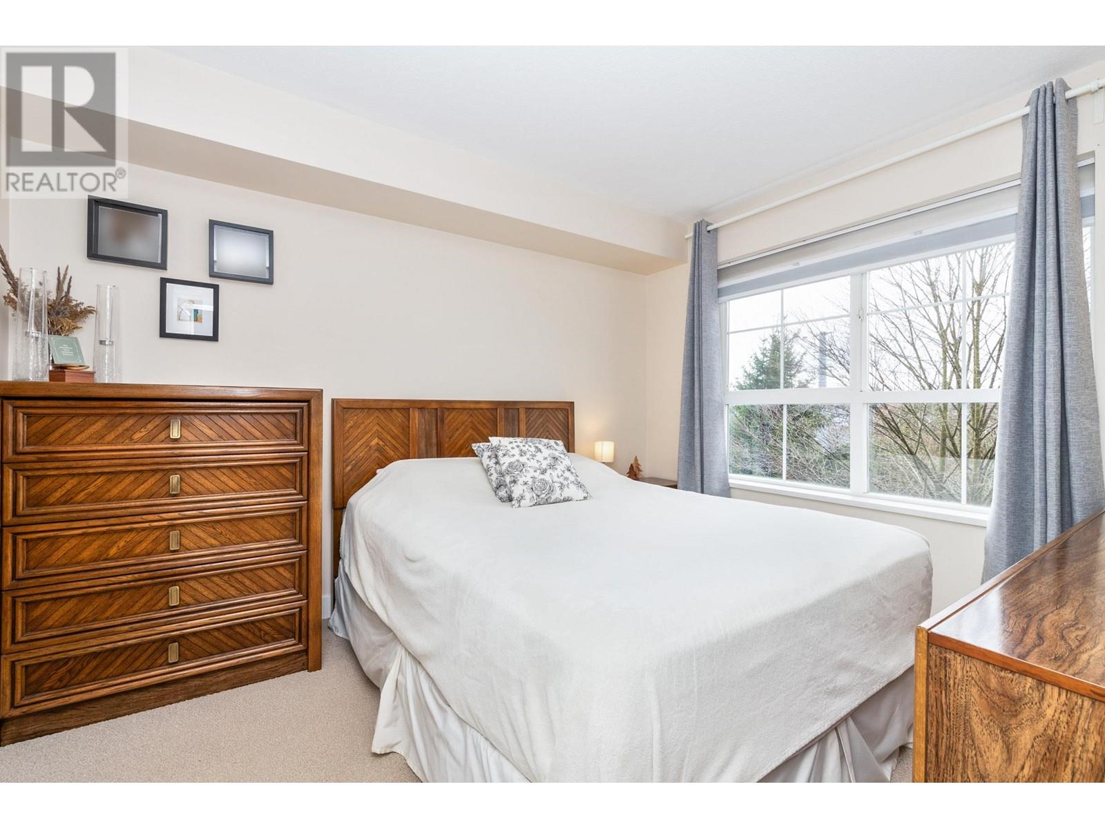 407 19677 Meadow Gardens Way, Pitt Meadows, British Columbia V3Y 0A2 - Photo 11 - R2945613