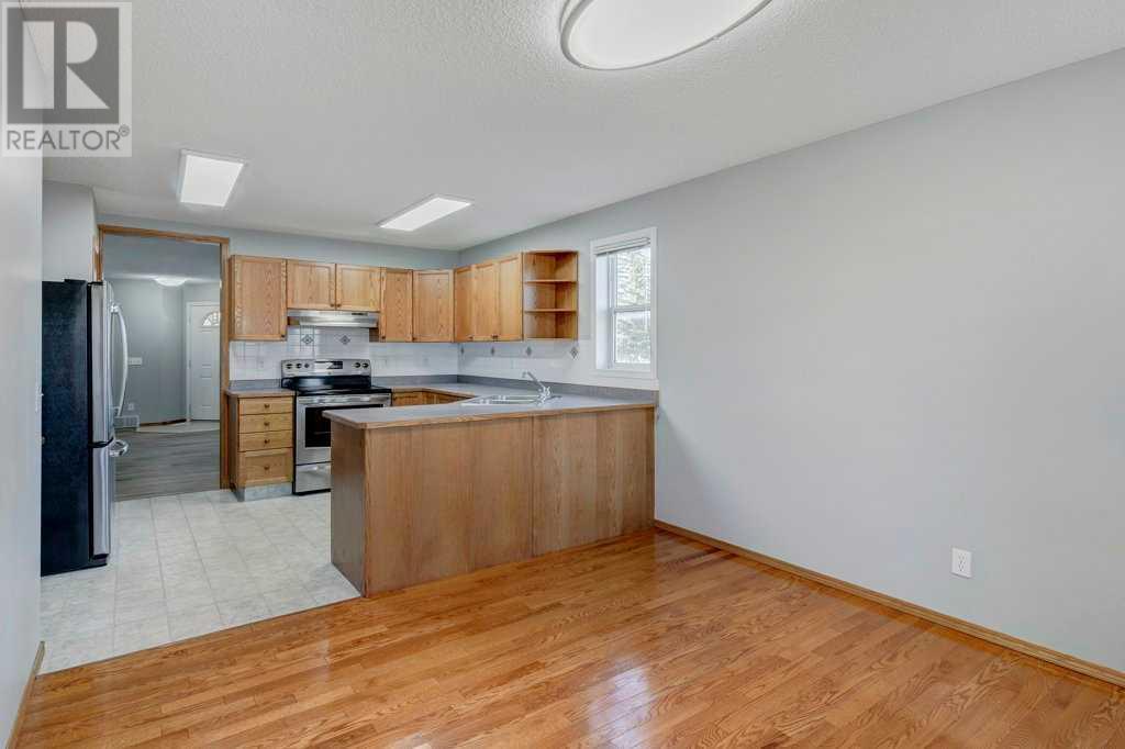 10980 Harvest Lake Way Ne, Calgary, Alberta  T3K 4K9 - Photo 8 - A2177348