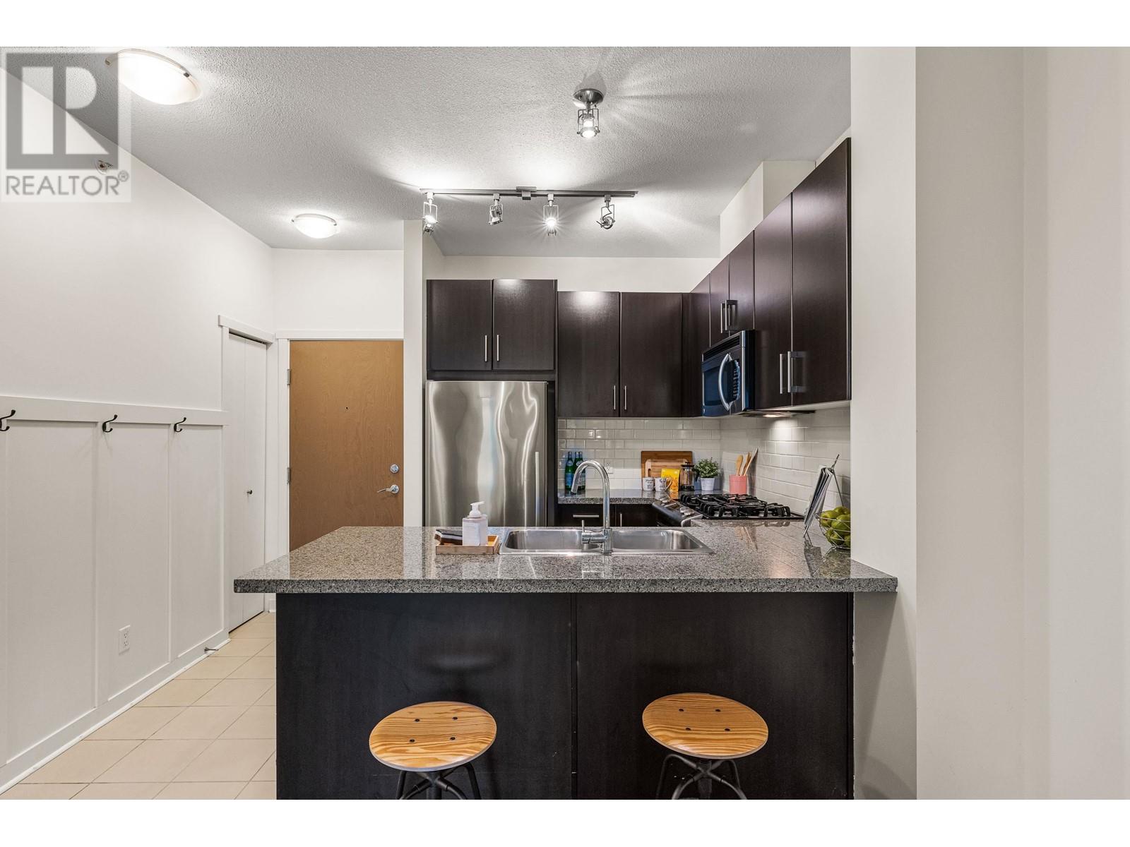 409 701 Klahanie Drive, Port Moody, British Columbia V3H 5L6 - Photo 9 - R2946734