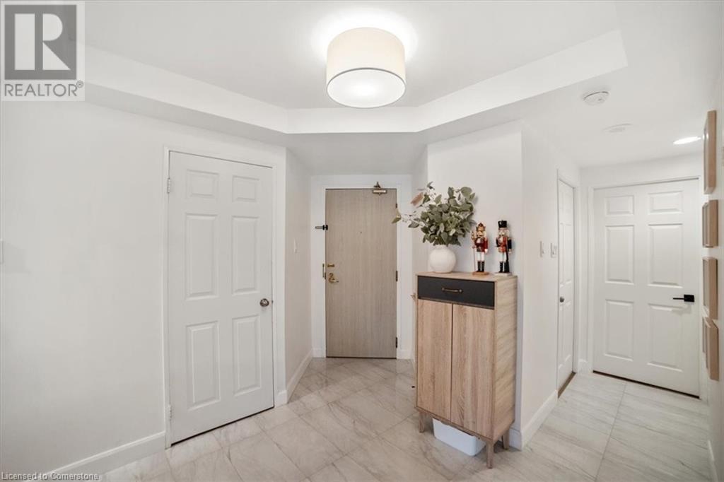 2155 Burnhamthorpe Road W Unit# 303, Mississauga, Ontario  L5L 5P4 - Photo 1 - 40681041