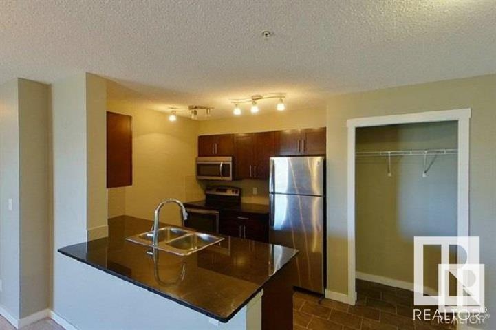 Property at #311 111 WATT CM SW image 3