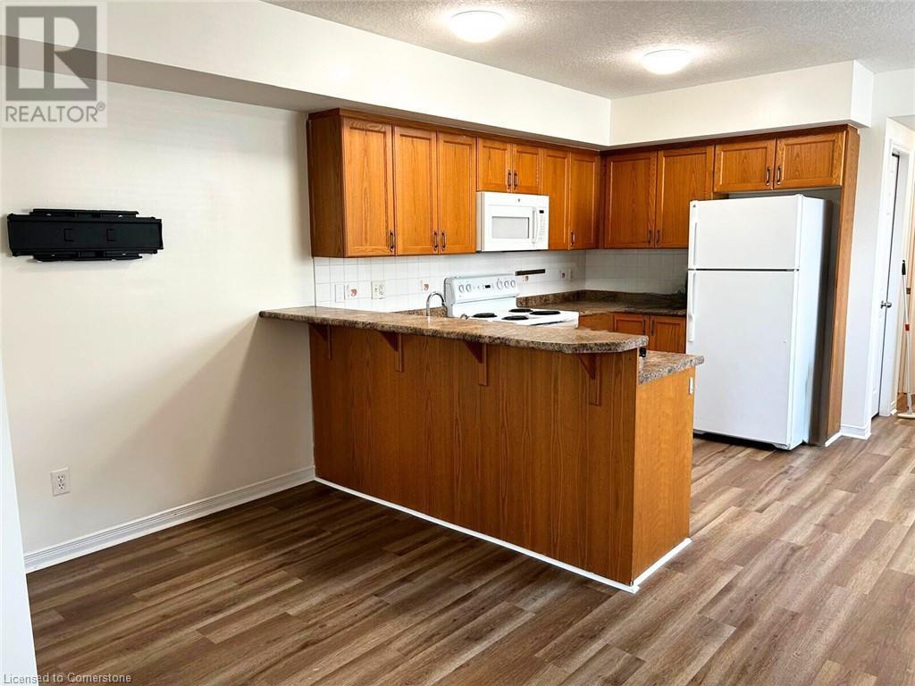 50 Howe Drive Unit# 19d, Kitchener, Ontario  N2E 0A3 - Photo 6 - 40682707