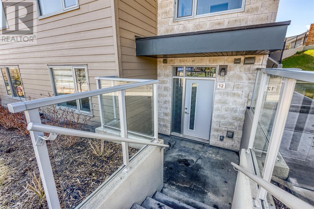 12, 30 Shawnee Common Sw, Calgary, Alberta  T2Y 0R1 - Photo 2 - A2178782