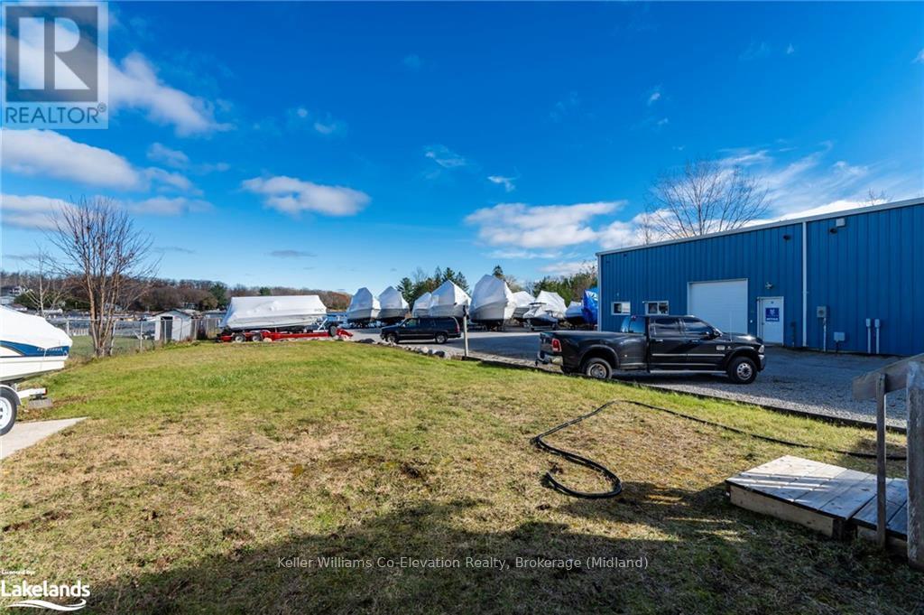 555 Champlain Road, Tiny, Ontario  L9M 0C2 - Photo 33 - S10440410