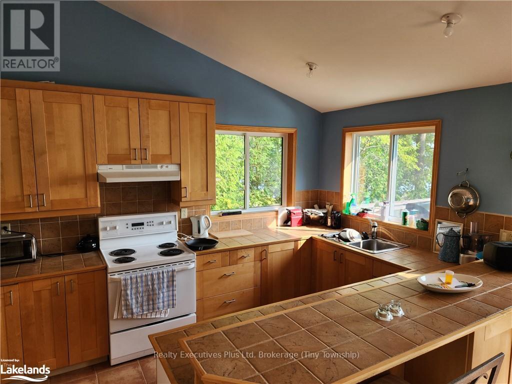 103 Kchi Sin Miikan, Christian Island 30, Ontario  L9M 0A9 - Photo 6 - S10437505