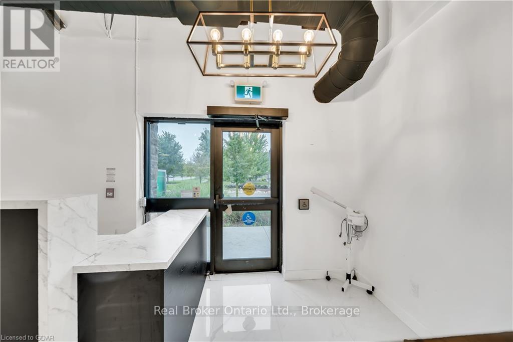 102 - 64 Frederick Drive, Guelph (Pine Ridge), Ontario  N1L 0K7 - Photo 2 - X10875631