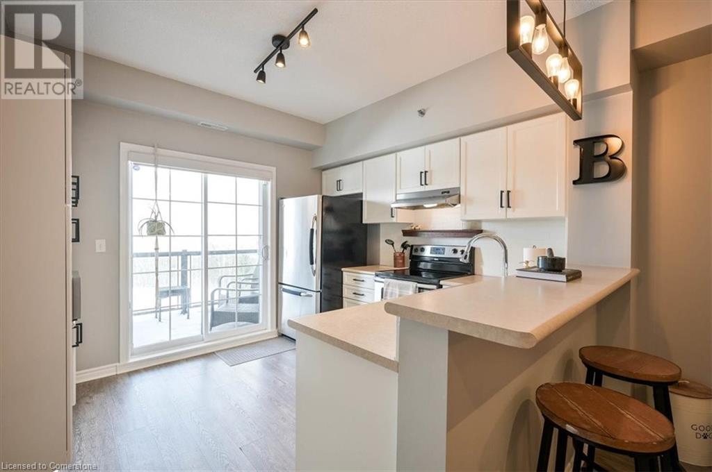 308 Watson Parkway N Unit# 407, Guelph, Ontario  N1E 0G7 - Photo 6 - 40683669