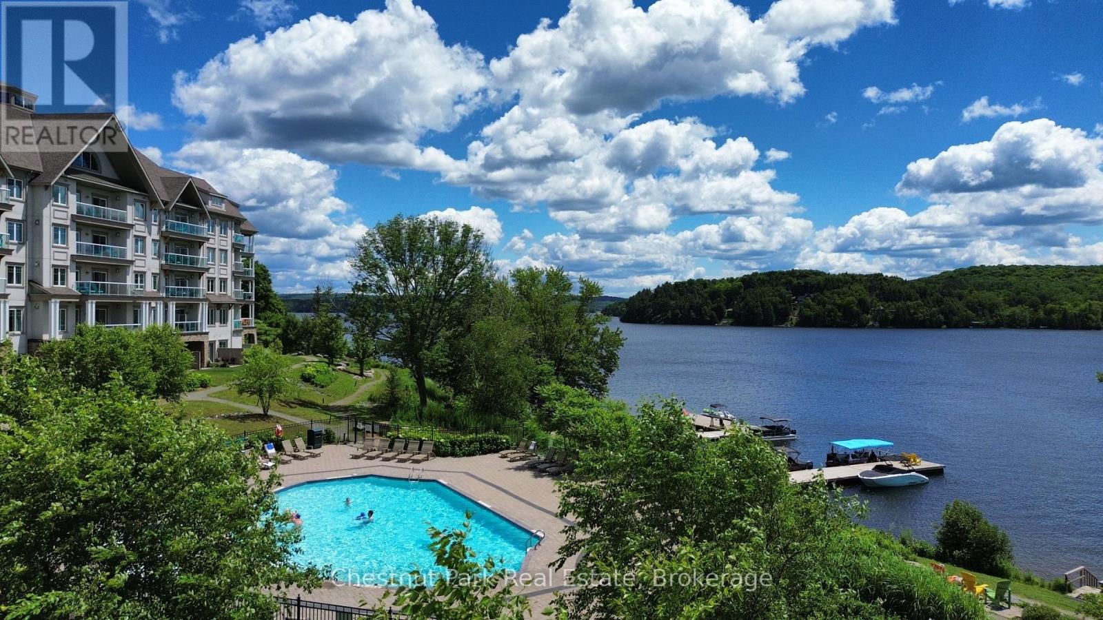 330 - 25 Pen Lake Point Road, Huntsville, Ontario  P1H 1A9 - Photo 2 - X11882883