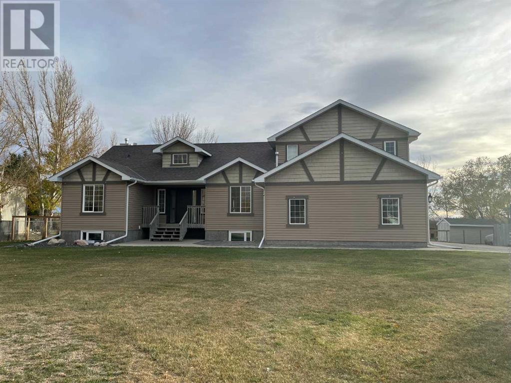 214 Falcon Ridge Way, Rural Lethbridge County, Alberta  T1J 5R8 - Photo 1 - A2177398