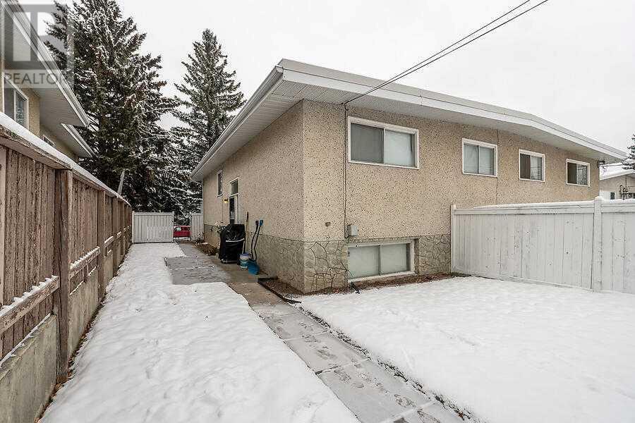 7331 Huntertown Crescent Nw, Calgary, Alberta  T2K 4K3 - Photo 3 - A2180371