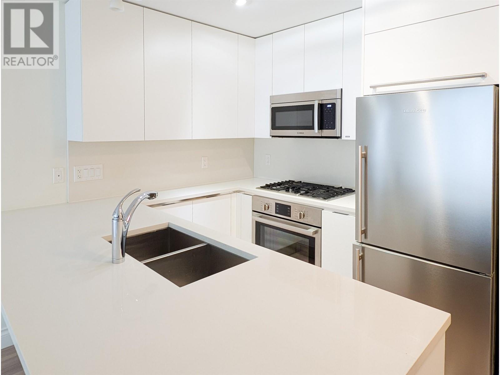 404 199 Victory Ship Way, North Vancouver, British Columbia  V9L 0E2 - Photo 5 - R2950853