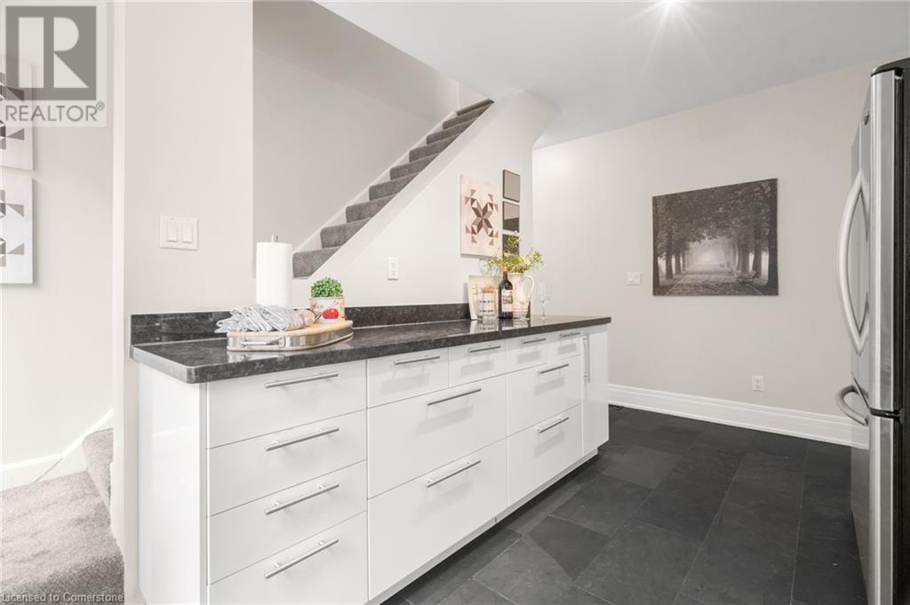 16 Coxwell Avenue, Toronto, Ontario  M4L 3A7 - Photo 18 - 40678756