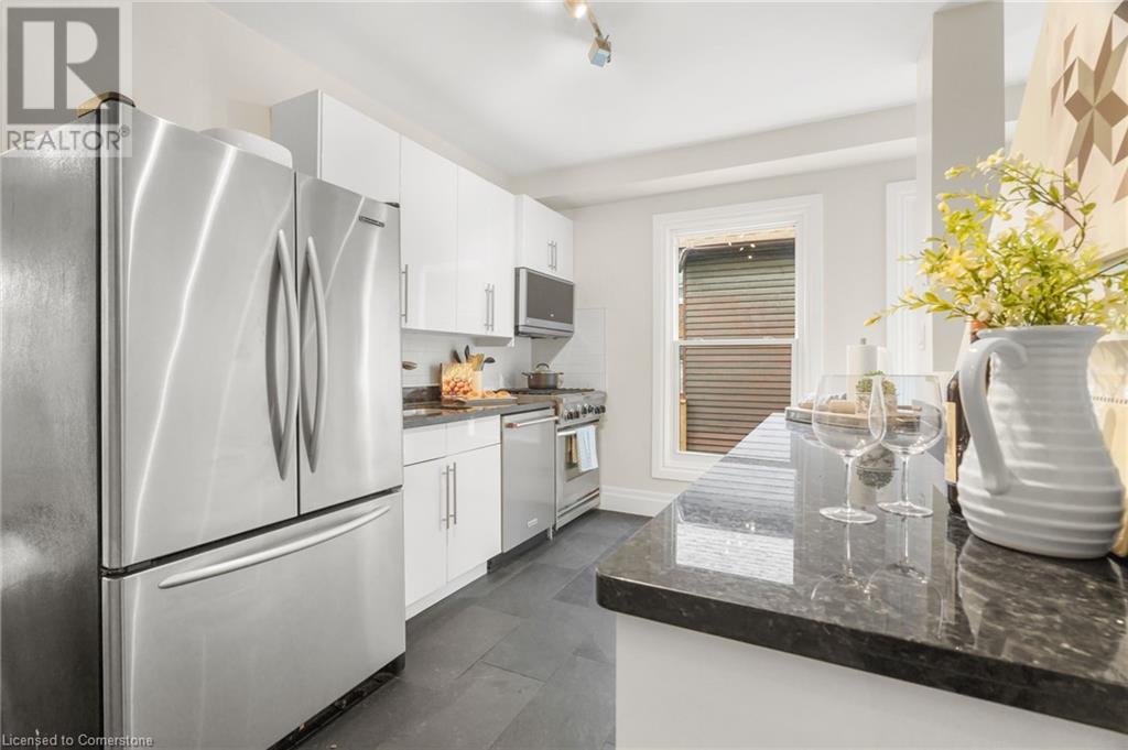 16 Coxwell Avenue, Toronto, Ontario  M4L 3A7 - Photo 15 - 40678756