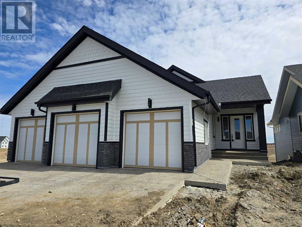 303 Muirfield Crescent, lyalta, Alberta