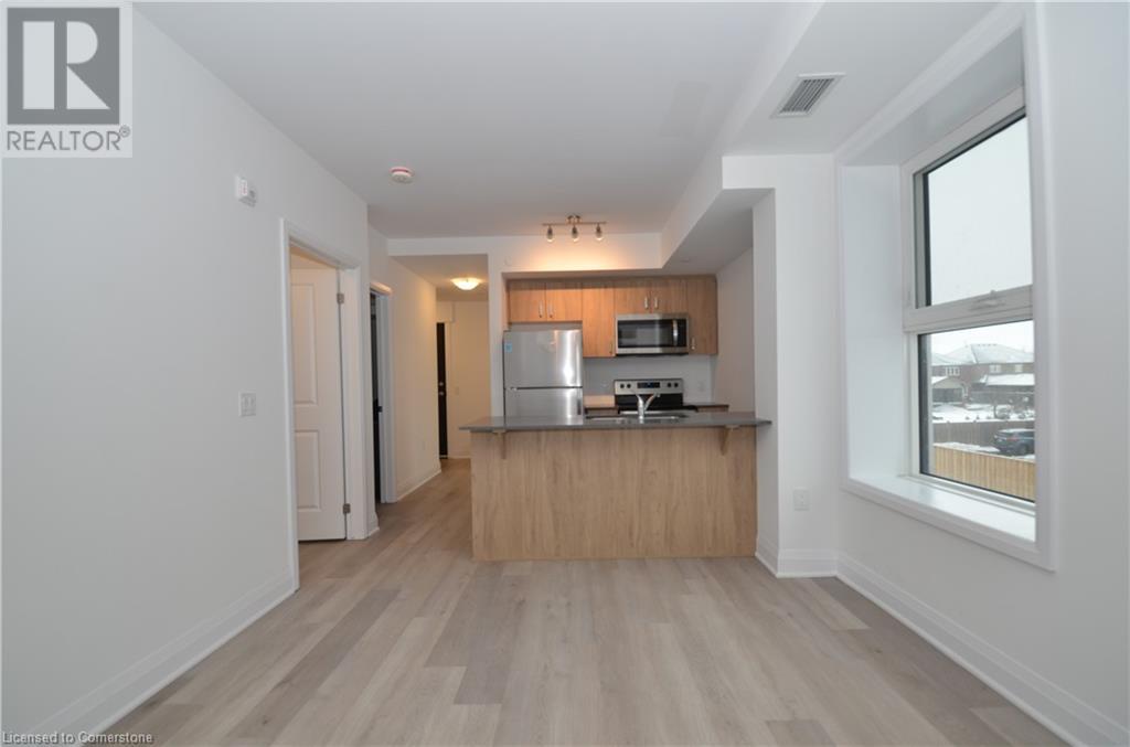 1936 Rymal Road E Unit# 205, Hamilton, Ontario  L0R 1P0 - Photo 3 - 40686143