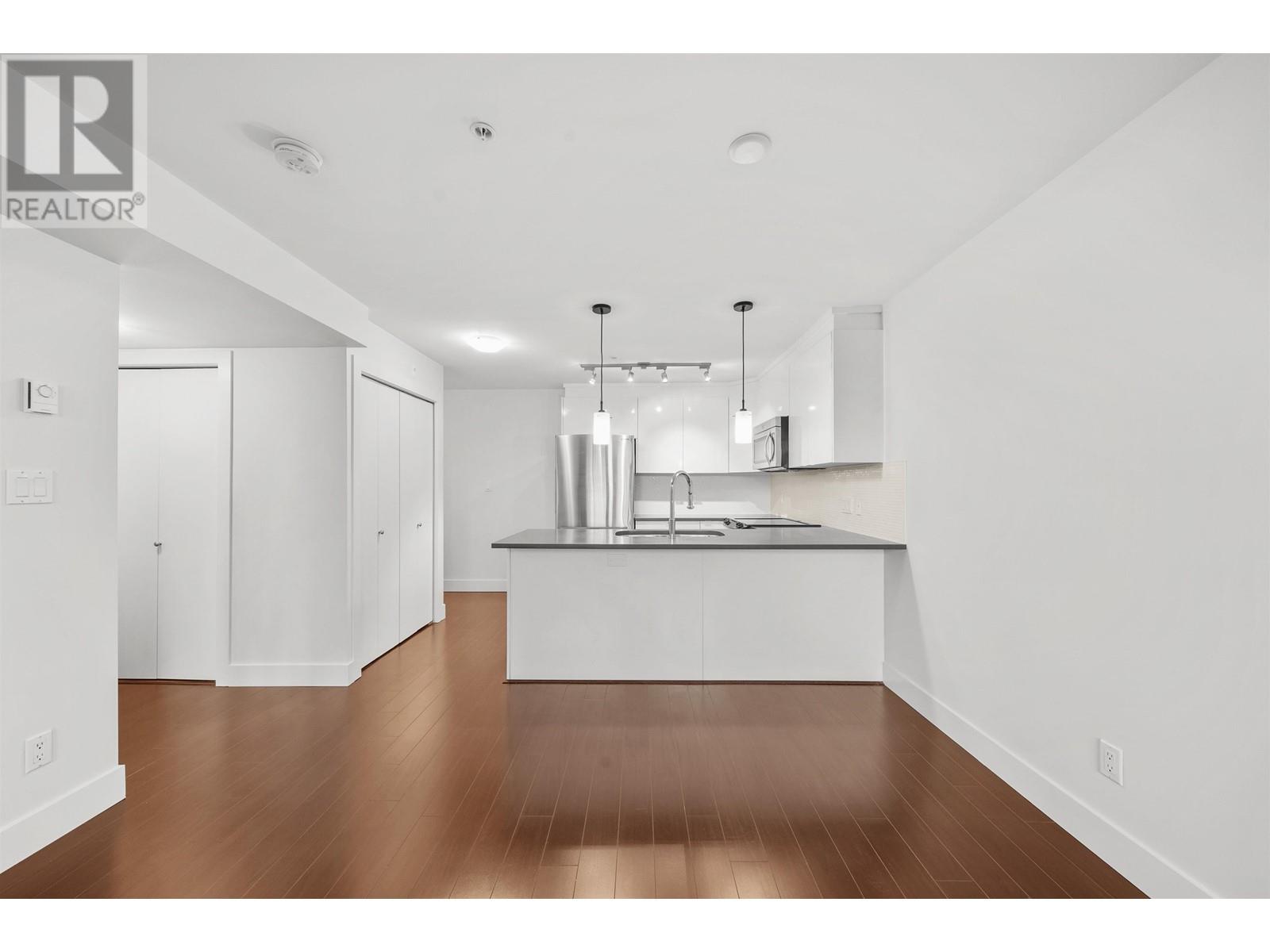 Property at 306 4338 COMMERCIAL STREET image 1