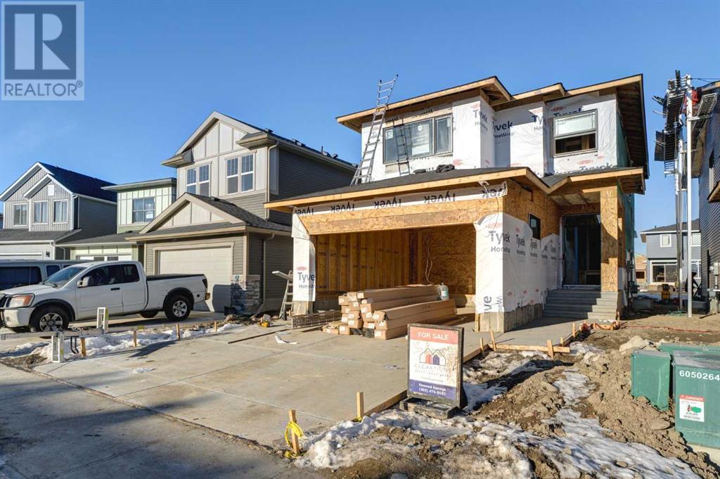 61 Quartz Crescent, Cochrane, Alberta  T4C 3C2 - Photo 2 - A2183392