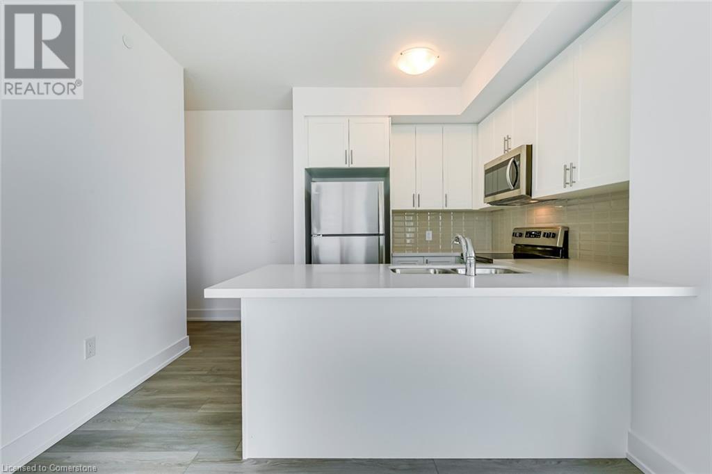 460 Dundas Street E Unit# 302Waterdown, Ontario  L0R 2H4 - Photo 2 - 40686781