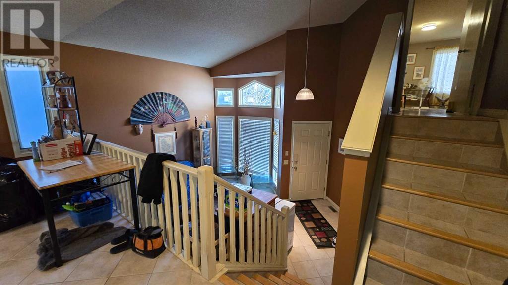 203 Arbour Summit Close Nw, Calgary, Alberta  T3G 3W1 - Photo 2 - A2185678