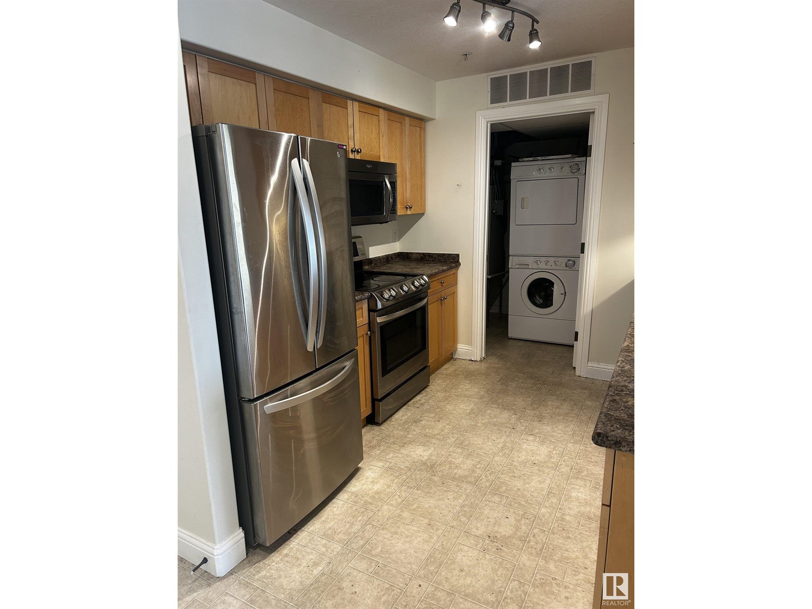 Property at #214 13005 140 AV NW image 2