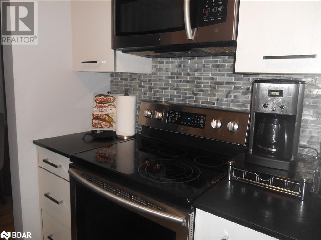 167 Edgehill Drive Unit# E4, Barrie, Ontario  L4N 1L9 - Photo 5 - 40688229