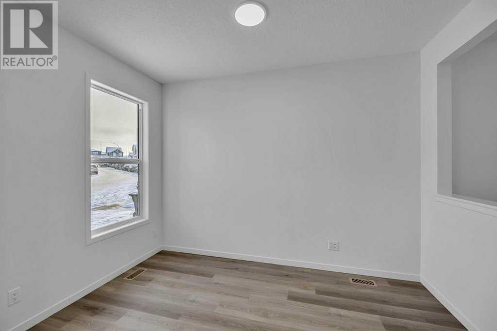 166 Edith Road Nw, Calgary, Alberta  T3R 2C8 - Photo 6 - A2185969