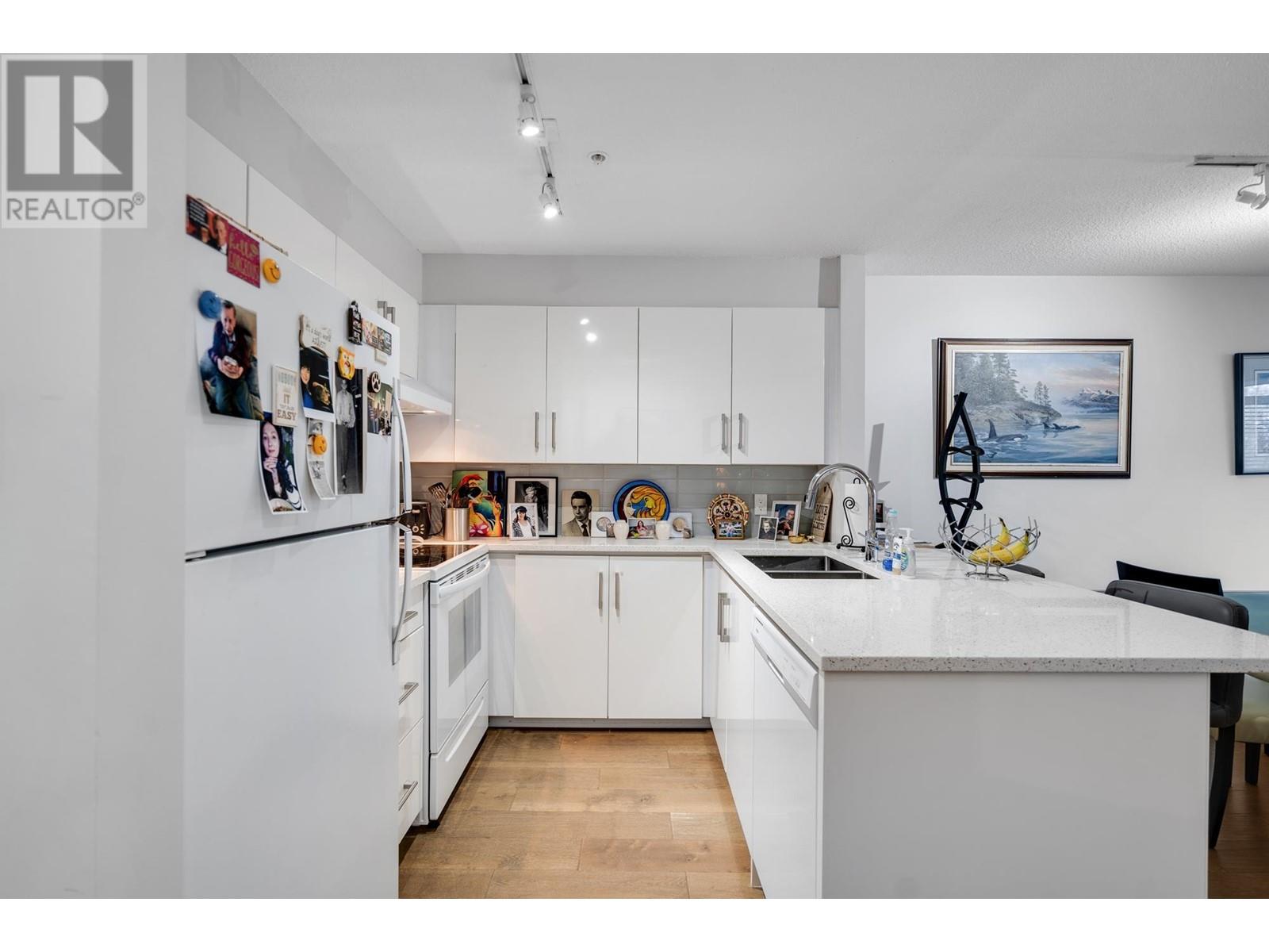 206 1208 Bidwell Street, Vancouver, British Columbia  V6G 2K9 - Photo 2 - R2953839