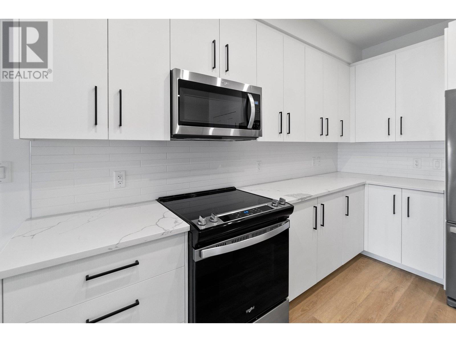Property at 3434 Mckinley Beach Drive Unit# 108 image 4