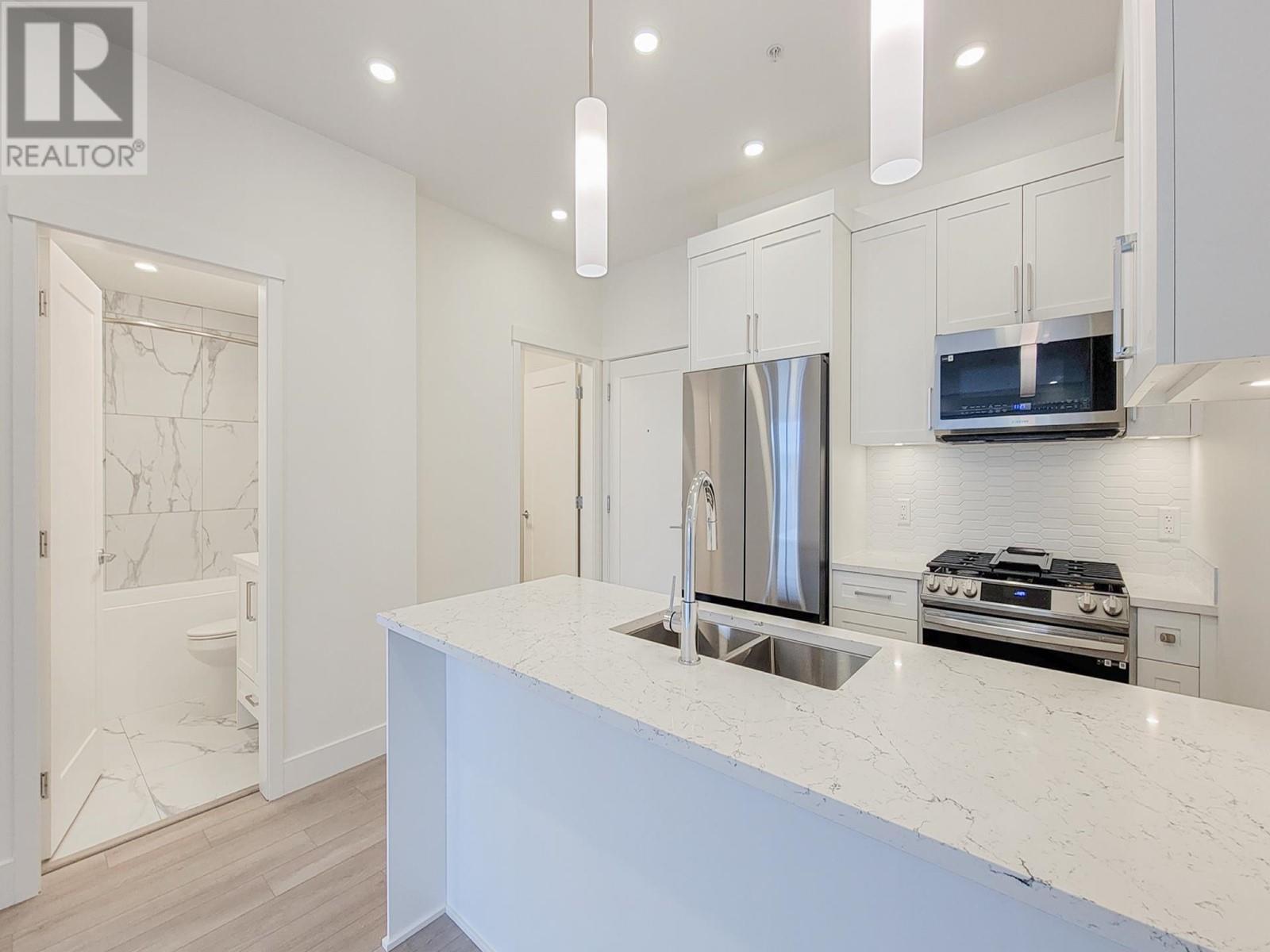 310 22633 Selkirk Avenue, Maple Ridge, British Columbia  V2X 1C7 - Photo 6 - R2954847