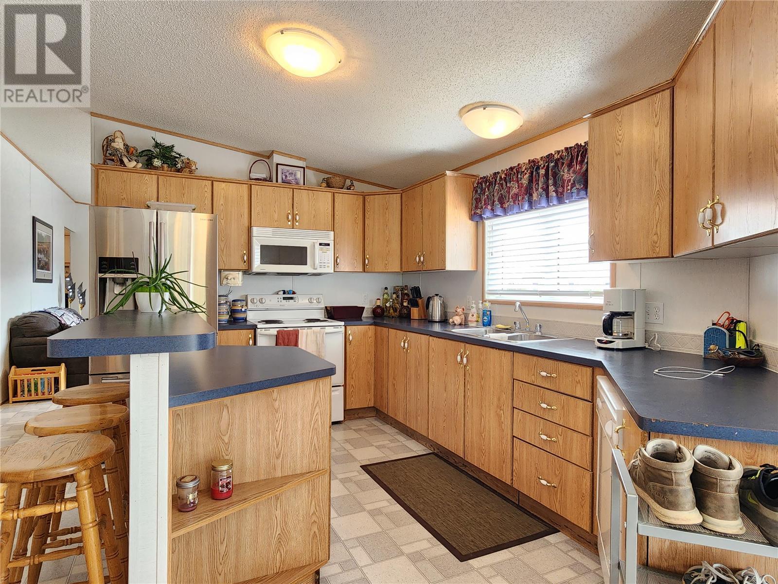 Property at 2035 Boucherie Road Unit# 117 image 4