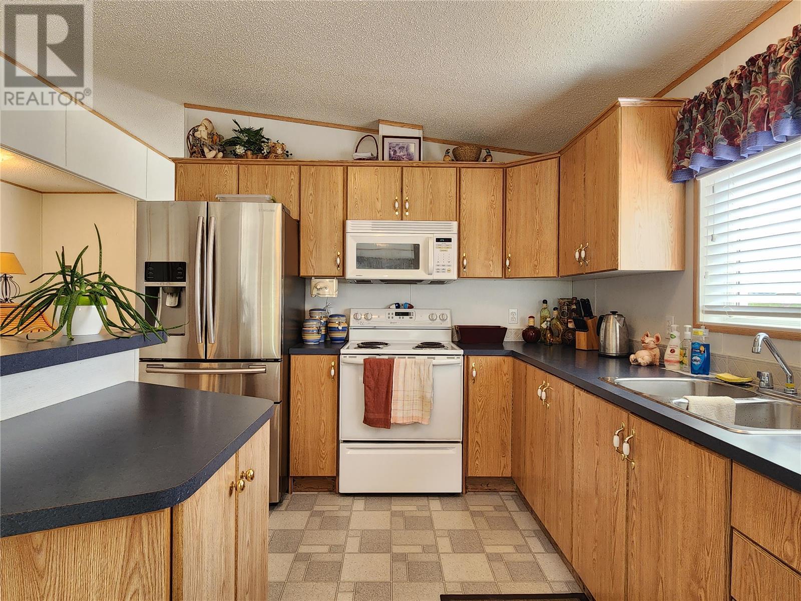 Property at 2035 Boucherie Road Unit# 117 image 5