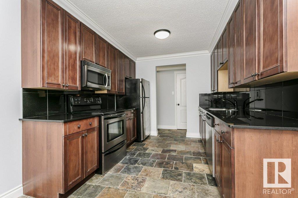 Property at #107 10745 83 AV NW image 3