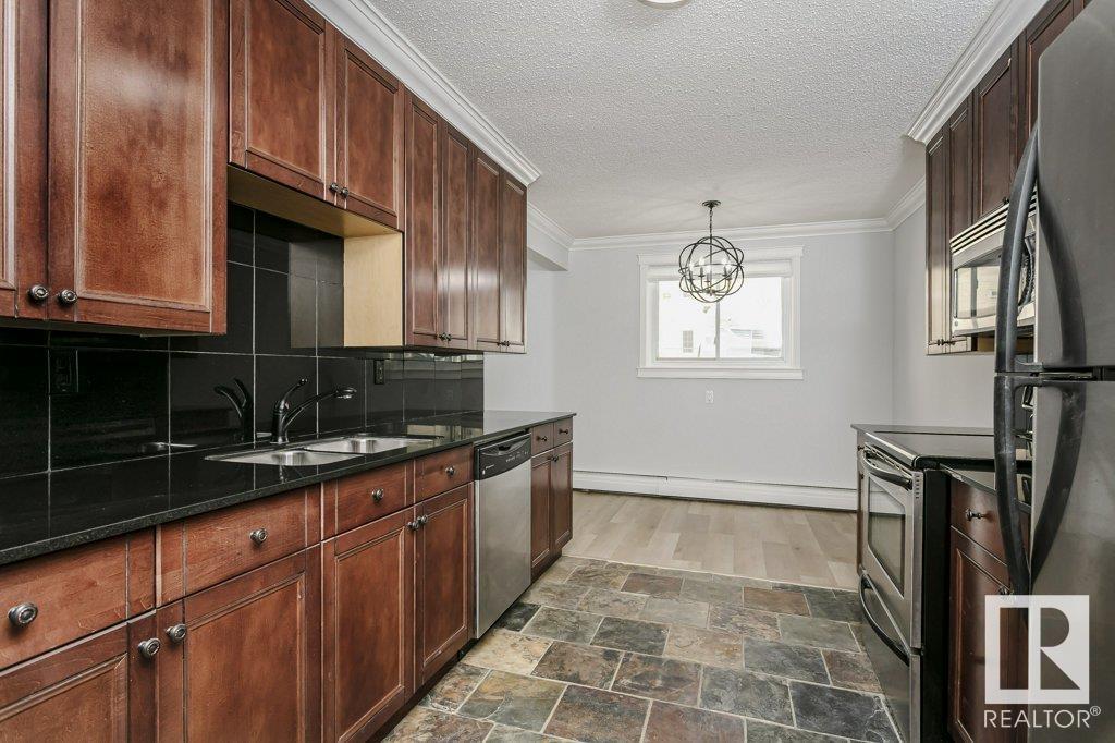 Property at #107 10745 83 AV NW image 4