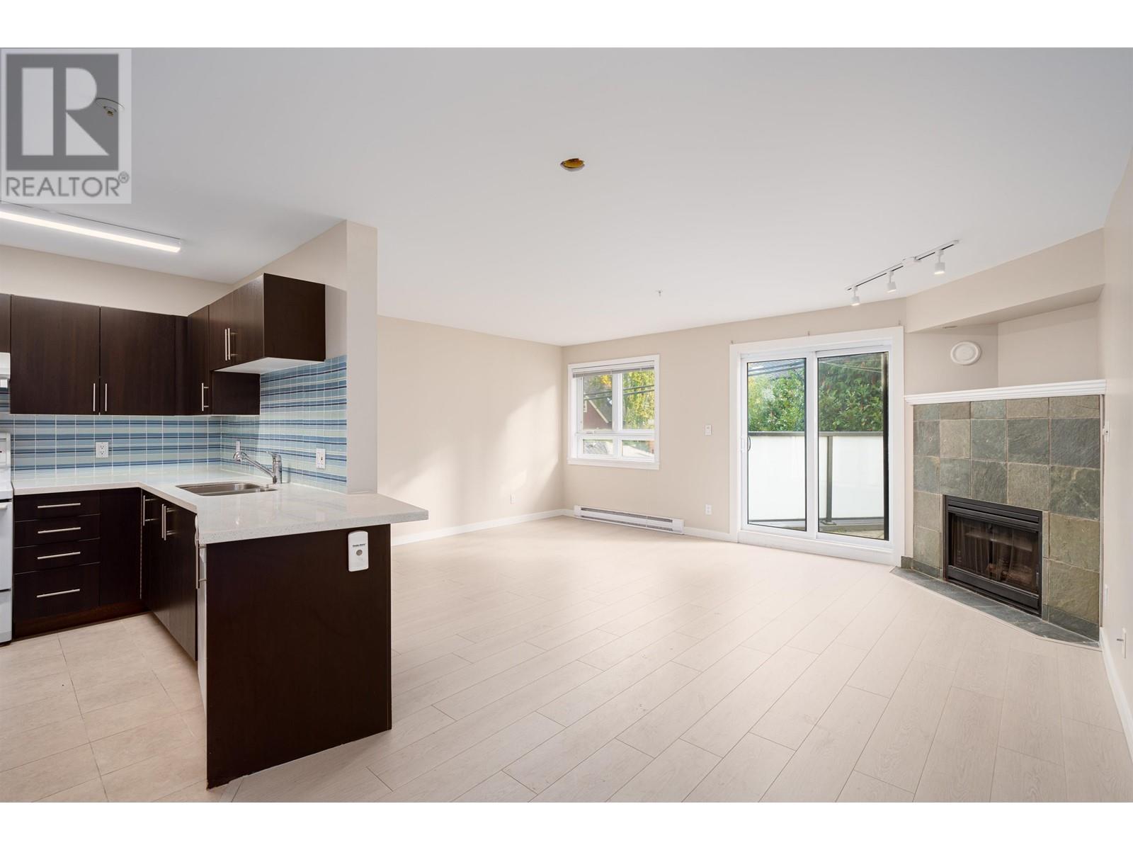 Listing Picture 2 of 19 : 104 3788 W 10TH AVENUE, Vancouver / 溫哥華 - 魯藝地產 Yvonne Lu Group - MLS Medallion Club Member