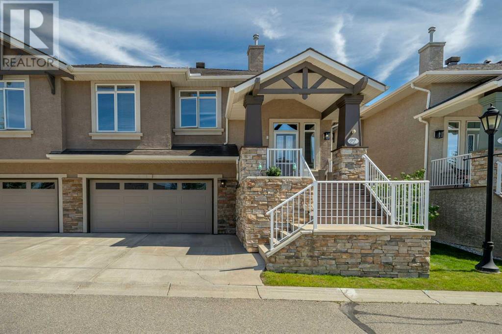 22 Discovery Woods Villas Sw, Calgary, Alberta  T3H 5A7 - Photo 2 - A2188727